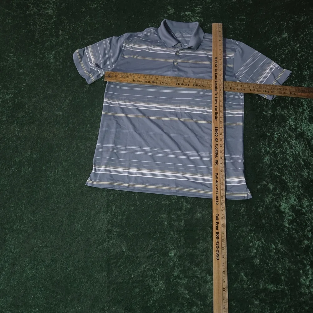 Nike Men's Polo in Blue with White and Yellow Stripes